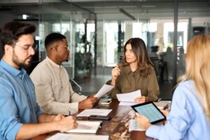 Diverse business team people having discussion at office meeting